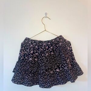 fits Size 00 Juniors Black Mini skirt With pink flowers and ruffles